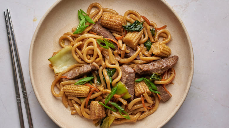 beef udon noodle stir-fry in a bowl