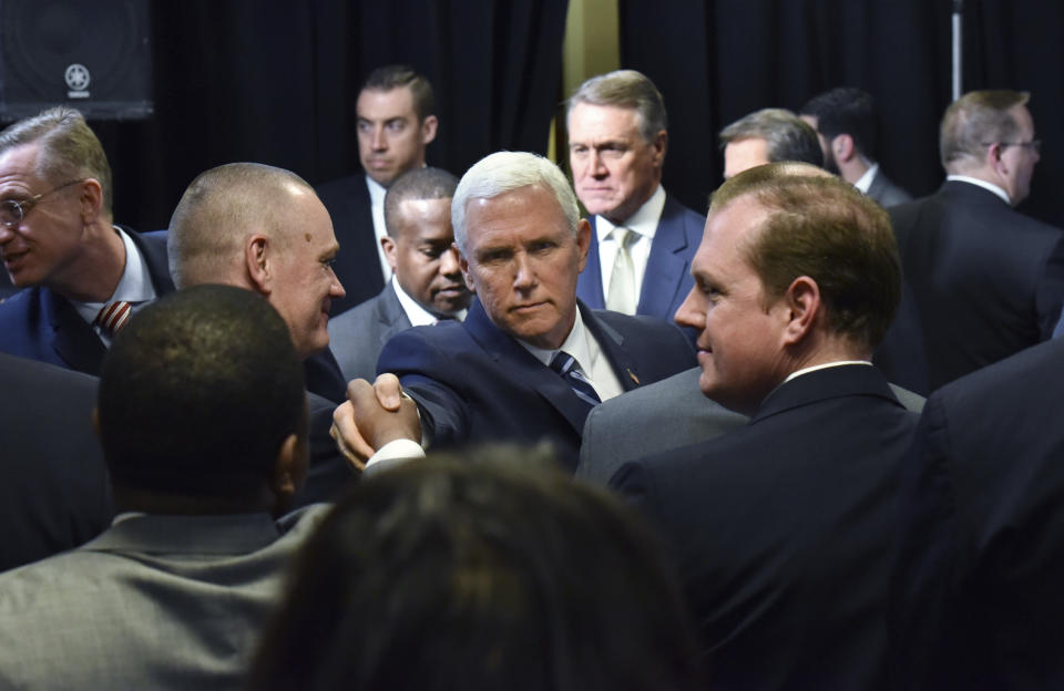 Vice President Mike Pence greets Immigration and Customs Enforcement employees after he spoke at Homeland Security Investigation Principal Field Offices in Atlanta on Thursday, March 21, 2019. (Hyosub Shin/Atlanta Journal-Constitution via AP, Pool)