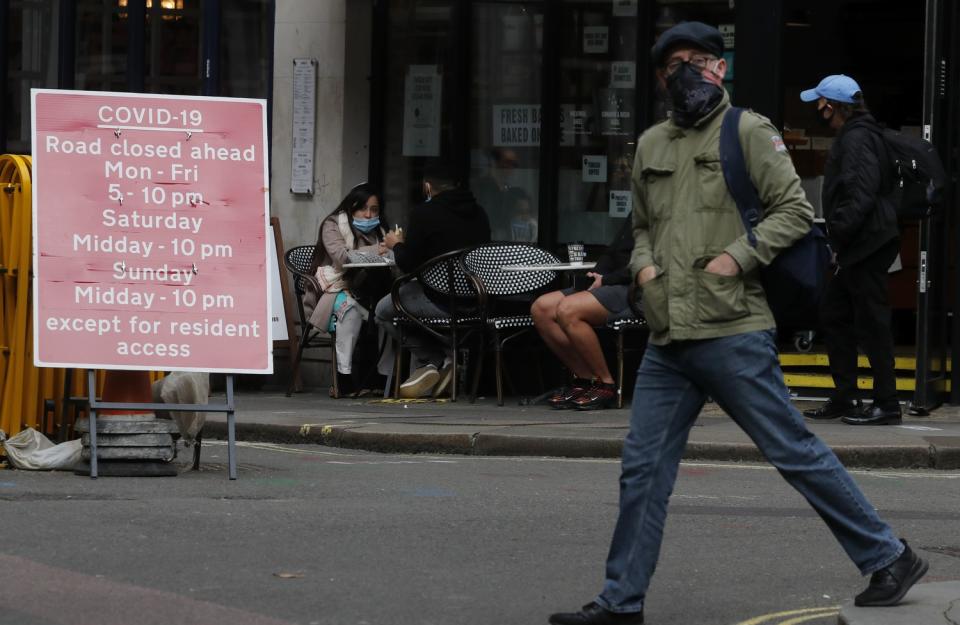 因疫情大流行，旅行遭到限制，旅遊業只能勉強維持經營。圖為英國倫敦街景。   圖：達志影像/美聯社