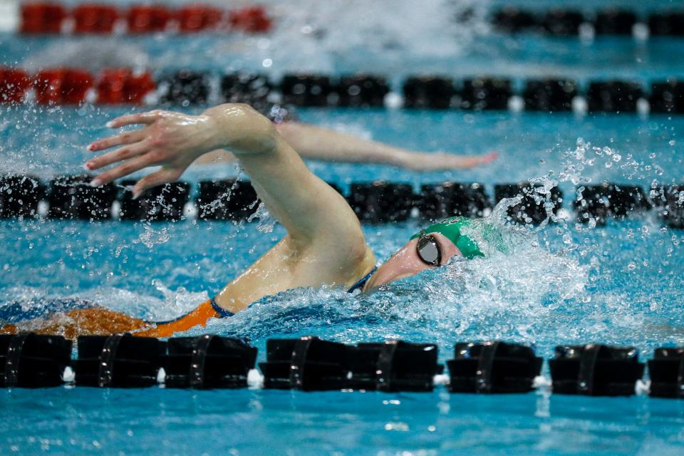Dublin Coffman’s Emily Brown swims to the 200 free championship last year at state.