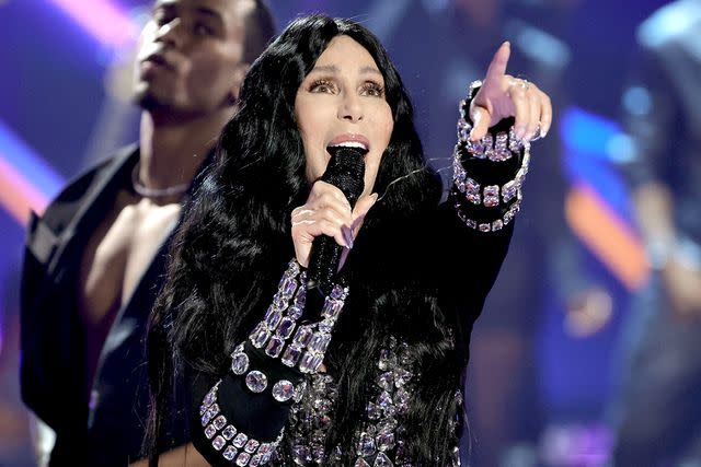 <p>Kevin Winter/Getty</p> Cher performs onstage during the 2024 iHeartRadio Music Awards in Los Angeles on April 1, 2024