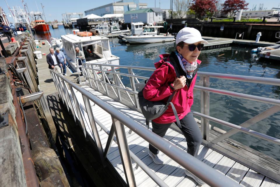 U.S. Department of Transportation Maritime Administration (MARAD) Rear Admiral Ann C. Phillips walks back up to street level after a tour of New Bedford harbor hosted by New Bedford Mayor Jon Mitchell and New Bedford Port Authority Executive Director Gordon Carr.