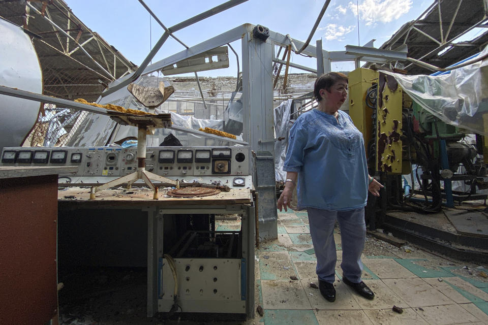 Galyna Tolstolutska, head of the department of radiation damage and radiation materials science of the National Scientific Center "Kharkov Institute of Physics and Technology" stands at her department which was heavily damaged after a Russian attack in Kharkiv, Ukraine, Thursday, May 18, 2023. Before Russia's invasion, the institute was a jewel in the crown of Ukraine's highly developed nuclear research sector. In communist times, its research helped develop nuclear weapons, making it a Soviet equivalent of Los Alamos in the United States. (AP Photo/Oleksandr Brynza)