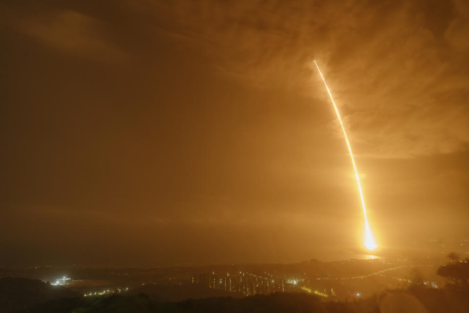 In this photo released by China's Xinhua News Agency, a Long March 7 rocket carrying the Tianzhou-2 spacecraft lifts off from the Wenchang Space Launch Center in Wenchang in southern China's Hainan Province, Saturday, May 29, 2021. A rocket carrying supplies for China's new space station blasted off Saturday from an island in the South China Sea. (Guo Wenbin/Xinhua via AP)