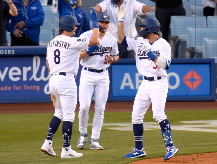 LOS ANGELES, CALIFORNIA - APRIL 10: Chris Taylor #3 of the Los Angeles Dodgers celebrates his three run homerun.