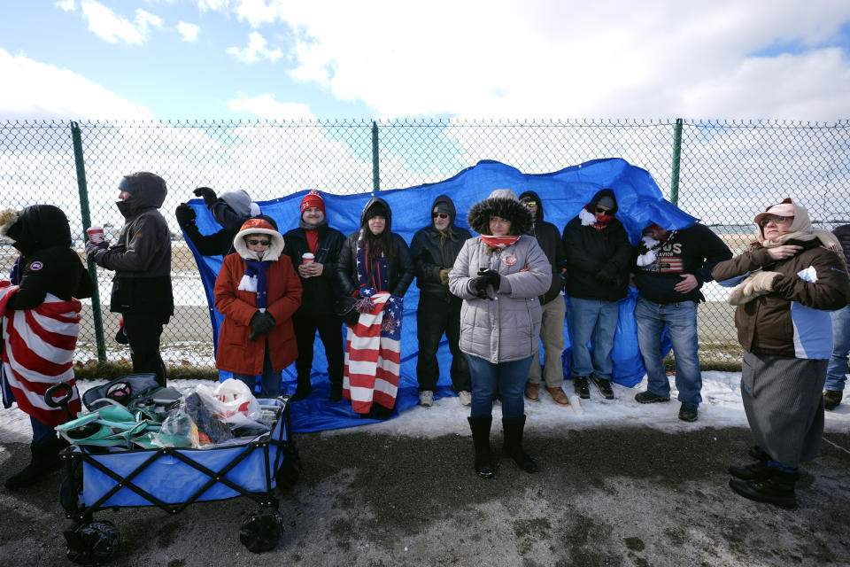 FILE - People wait in line before former President Donald Trump speaks at a campaign rally in Waterford Township, Mich., Feb. 17, 2024. A Democratic group is rolling out a new $140 million ad campaign this week that aims to chip away at Trump's support among one of his most loyal voting blocs: rural voters. The ads from American Bridge 21st Century will begin airing Monday, May 13, in the northern battleground states of Pennsylvania, Michigan and Wisconsin. (AP Photo/Paul Sancya, File)