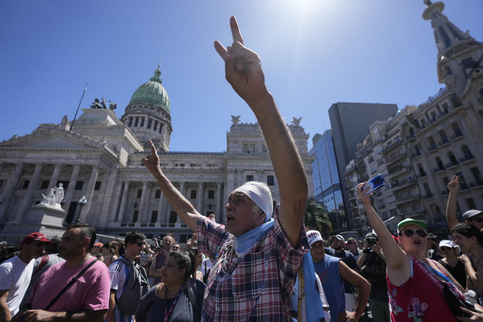 Demonstrators gather outside Congress during a national strike against the economic and labor reforms proposed by Argentine President Javier Milei's government in Buenos Aires, Argentina, Wednesday, Jan. 24, 2024. (AP Photo/Natacha Pisarenko)