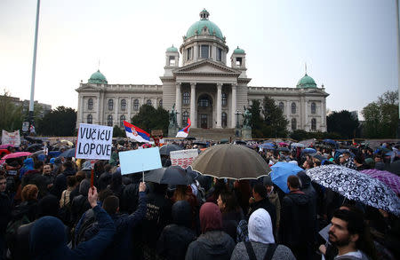 Protesters take part in a demonstration against the overwhelming victory of Prime Minister Aleksandar Vucic in Serbia's presidential election in Belgrade, Serbia April 5, 2017. REUTERS/Djordje Kojadinovic