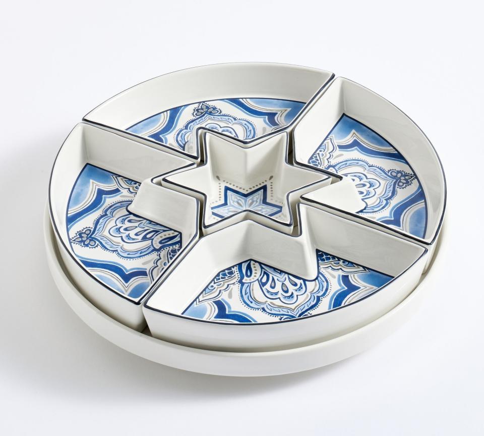 <p><a href="https://go.redirectingat.com?id=74968X1596630&url=https%3A%2F%2Fwww.potterybarn.com%2Fproducts%2Fhanukkah-medallion-lazy-susan%2F&sref=https%3A%2F%2Fwww.womansday.com%2Fhome%2Fdecorating%2Fg34087622%2Fhanukkah-decorations%2F" rel="nofollow noopener" target="_blank" data-ylk="slk:Shop Now;elm:context_link;itc:0;sec:content-canvas" class="link ">Shop Now</a></p><p>Hanukkah Medallion Lazy Susan</p><p>potterybarn.com</p><p>$129.00</p>