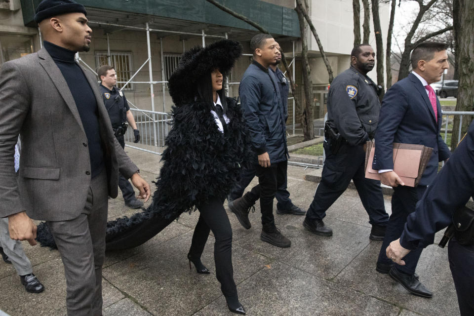 Rapper Cardi B leaves Queens Criminal Court after a hearing, Tuesday, Dec. 10, 2019 in New York. (AP Photo/Mark Lennihan)