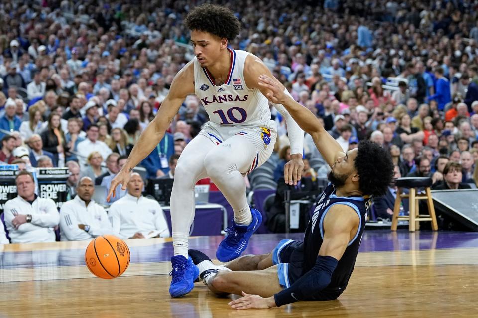 Jalen Wilson drives to the basket for Kansas during the second half of a Final Four game against Villanova during the NCAA tournament on April 2, 2022, in New Orleans.