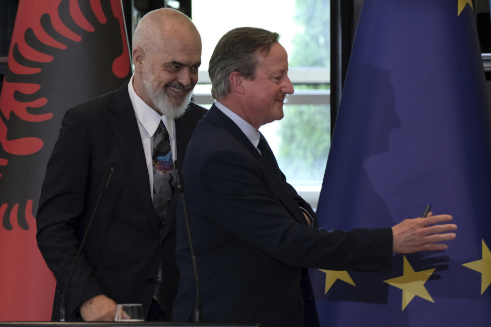 British Foreign Secretary David Cameron, right, and Albania's Prime Minister Edi Rama leave after a news conference in Tirana, Albania, Wednesday, May 22, 2024. Cameron hailed progress in a U.K.-Albania joint effort to cut illegal migration. (AP Photo/Vlasov Sulaj)