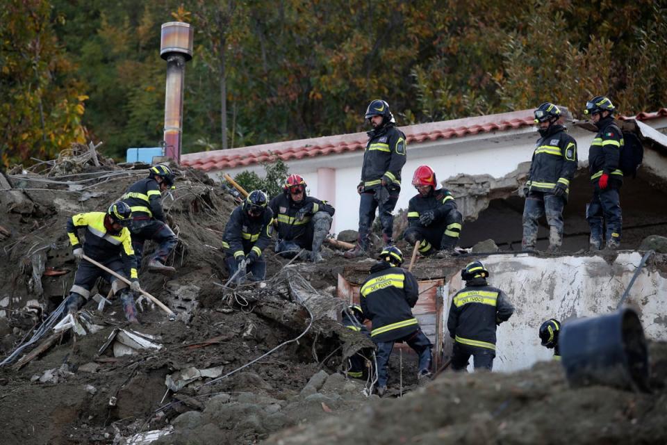 Authorities said that the landslide swept parked cars into the sea (AP)