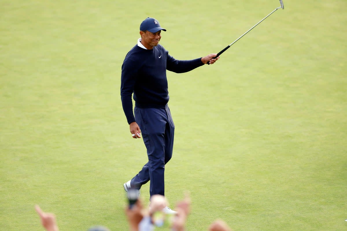 Tiger Woods marked his return to competitive action with a closing trio of birdies as he carded 69 during the first round of the Genesis Invitational (Ryan Kang/AP) (AP)