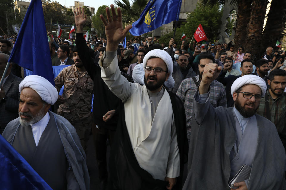 Iranian demonstrators chant slogans during their anti-Israeli gathering at the Felestin (Palestine) Sq. in Tehran, Iran, Monday, April 15, 2024. World leaders are urging Israel not to retaliate after Iran launched an attack involving hundreds of drones, ballistic missiles and cruise missiles. (AP Photo/Vahid Salemi)