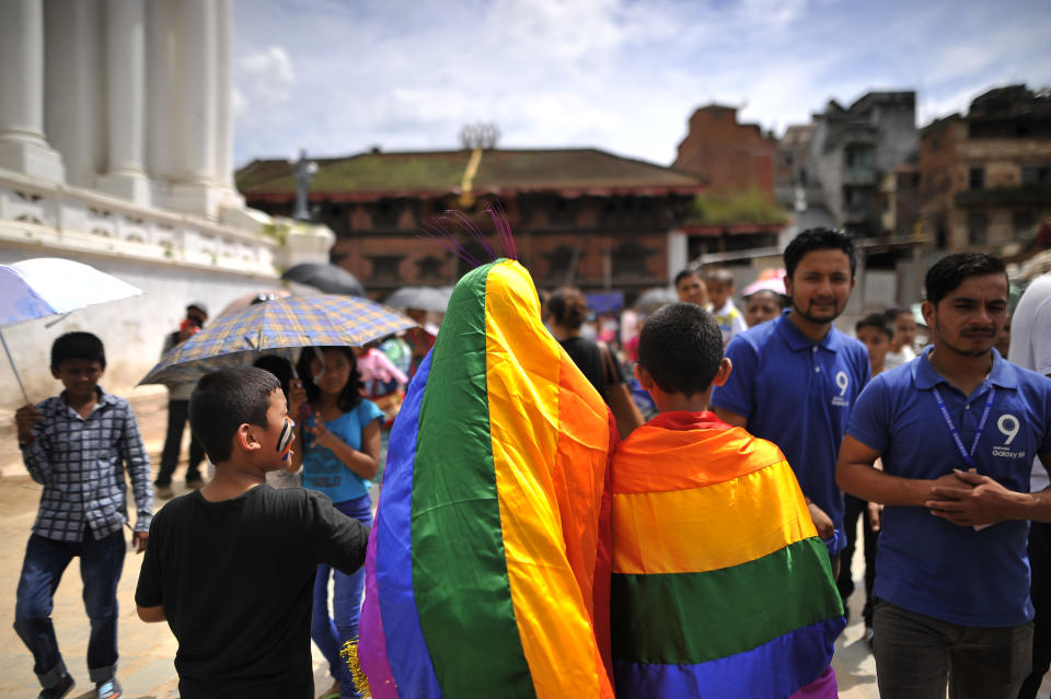 Members of Nepalese Lesbian, Gay, Bisexual and Transgender (LGBT) holds rainbow color flag in a LGBT pride parade during Gai Jatra Festival celebrated in Kathmandu, Nepal on Monday, August 27, 2018. (Photo by Narayan Maharjan/NurPhoto via Getty Images)