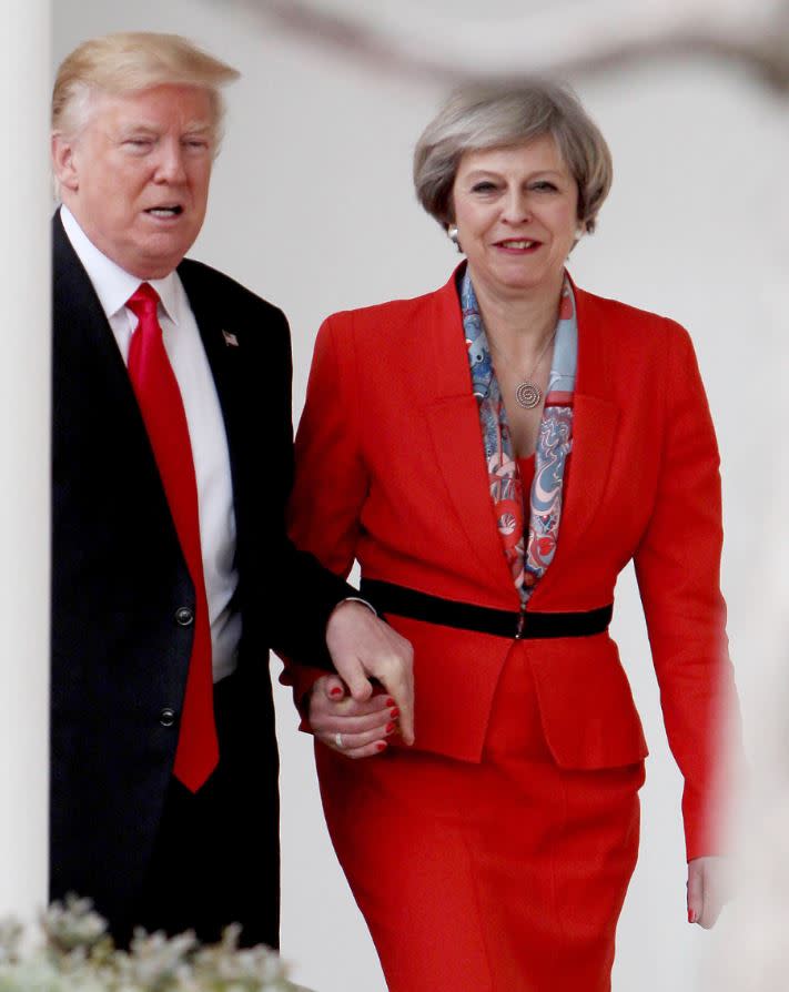 Donald Trump and Theresa May pictured during their famous hand-holding moment in Washington in January (Rex) 