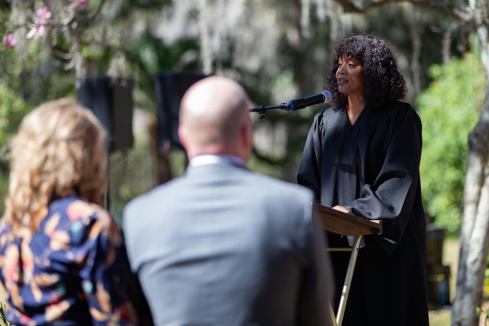 Clerk of Courts Gwen Marshall helps more than a dozen couples tie the knot with her second annual group wedding at Goodwood Museum and Gardens on Valentine's Day.