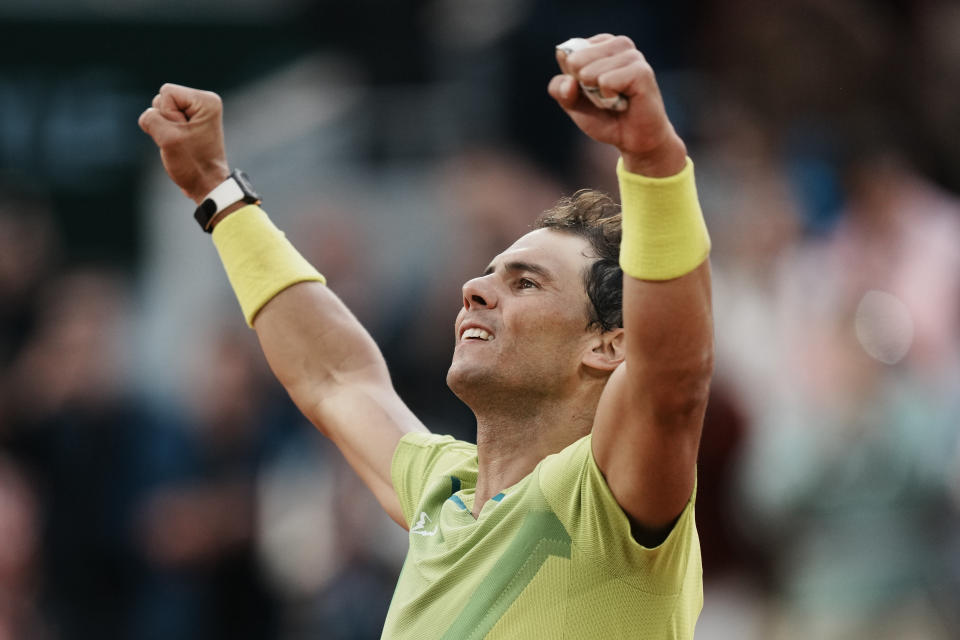 Spain's Rafael Nadal celebrates winning against Canada's Felix Auger-Aliassime in 5 sets, 3-6, 6-3, 6-2, 3-6, 6-3, during their fourth round match at the French Open tennis tournament in Roland Garros stadium in Paris, France, Sunday, May 29, 2022. (AP Photo/Thibault Camus)