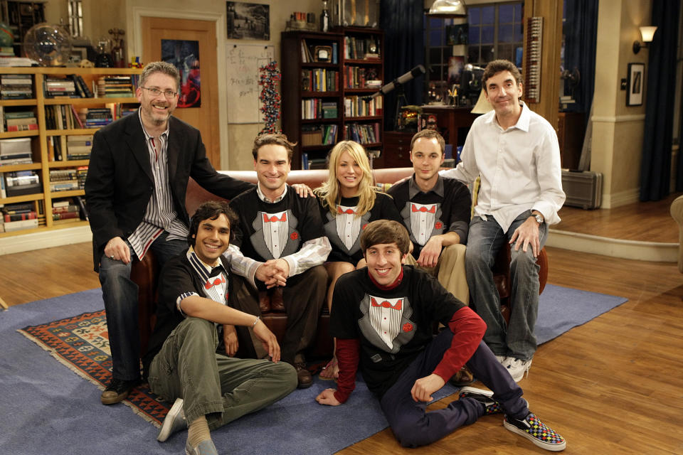 Kunal Nayyar (second to the left), Johnny Galecki (third from left), Kaley Cuoco (center), Jim Parsons (second from right) and Simon Helberg (foreground, right) - on set with executive producers Bill Prady (far left) and Chuck Lorre (far right).  The first season finale of THE BIG BANG THEORY, Monday, May 19, 2008 on the CBS Television Network. (Photo by Sonja Flemming/CBS via Getty Images) 