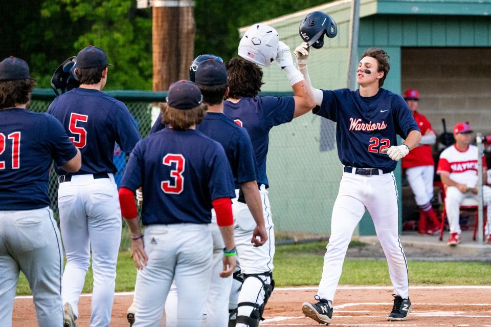 Lincoln-Sudbury shortstop Jake Haarde celebrates with teammates after his home-run in the very first at-bat of the opening round of the Rich Pedroli Daily News Classic game in Natick, May 25, 2023.