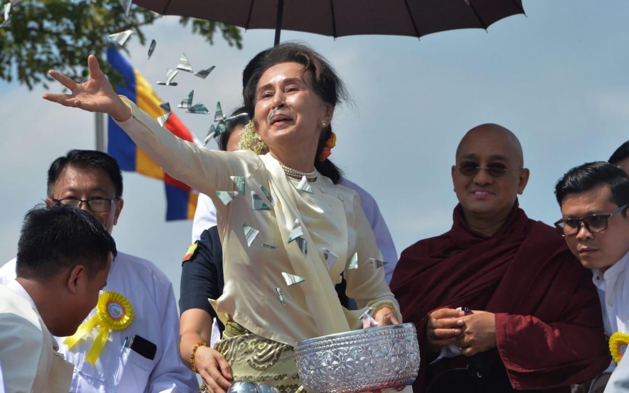 Myanmar State Counsellor Aung San Suu Kyi has been legally targeted for the first time - AFP