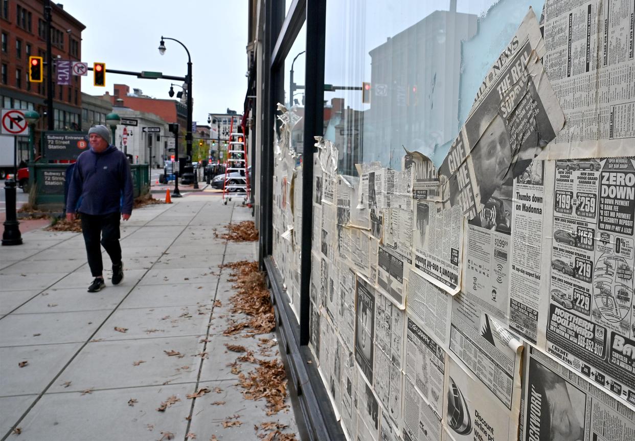 New York newspapers from 2000 were used to cover storefronts on Main Street for "The Walking Dead: Dead City."