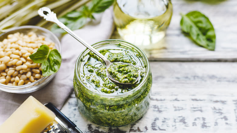 jar of pesto with spoon