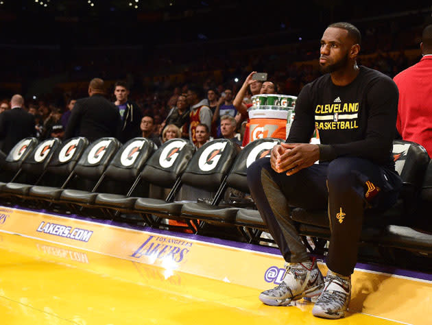 LeBron James sits in Los Angeles and he likely won’t make room on the bench for LaVar Ball. (Getty Images)