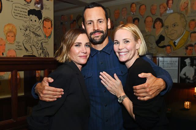 <p>Roy Rochlin/Getty</p> Kristen Wiig, Avi Rothman and Leslie Bibb