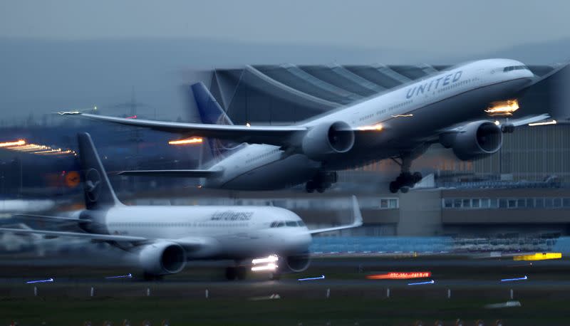 Airplanes of German Carrier Lufthansa and United Airlines land and take off at Frankfurt Airport