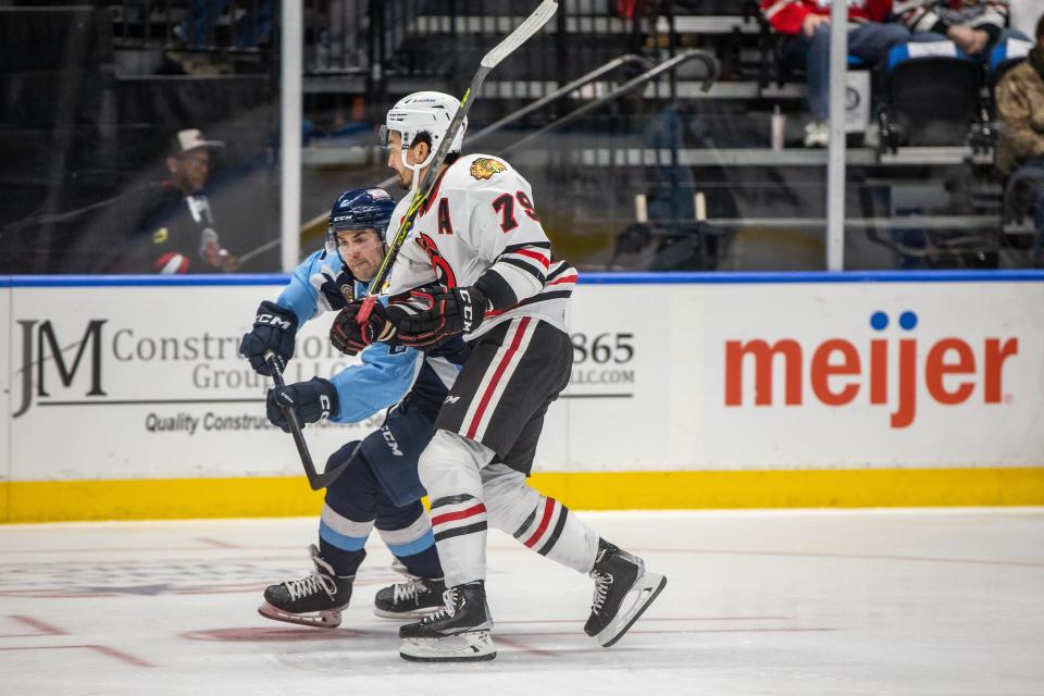 Dylan Sikura, shown here battling for the puck during a recent IceHogs game in Rockford, has the Hogs on a bit of an early-season hot streak right now.