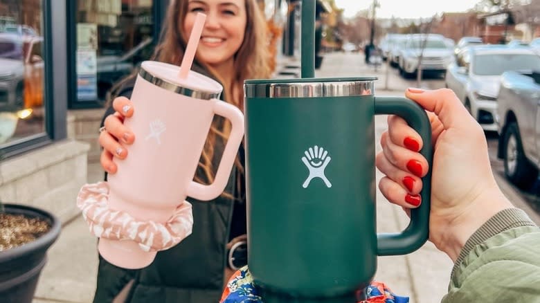 women toasting with hydro flask 