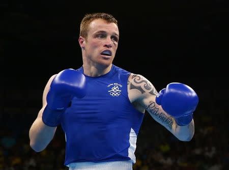 2016 Rio Olympics - Boxing - Quarterfinal - Men's Welter (69kg) Quarterfinals Bout 156 - Riocentro - Pavilion 6 - Rio de Janeiro, Brazil - 13/08/2016. Steven Donnelly (IRL) of Ireland competes. REUTERS/Peter Cziborra