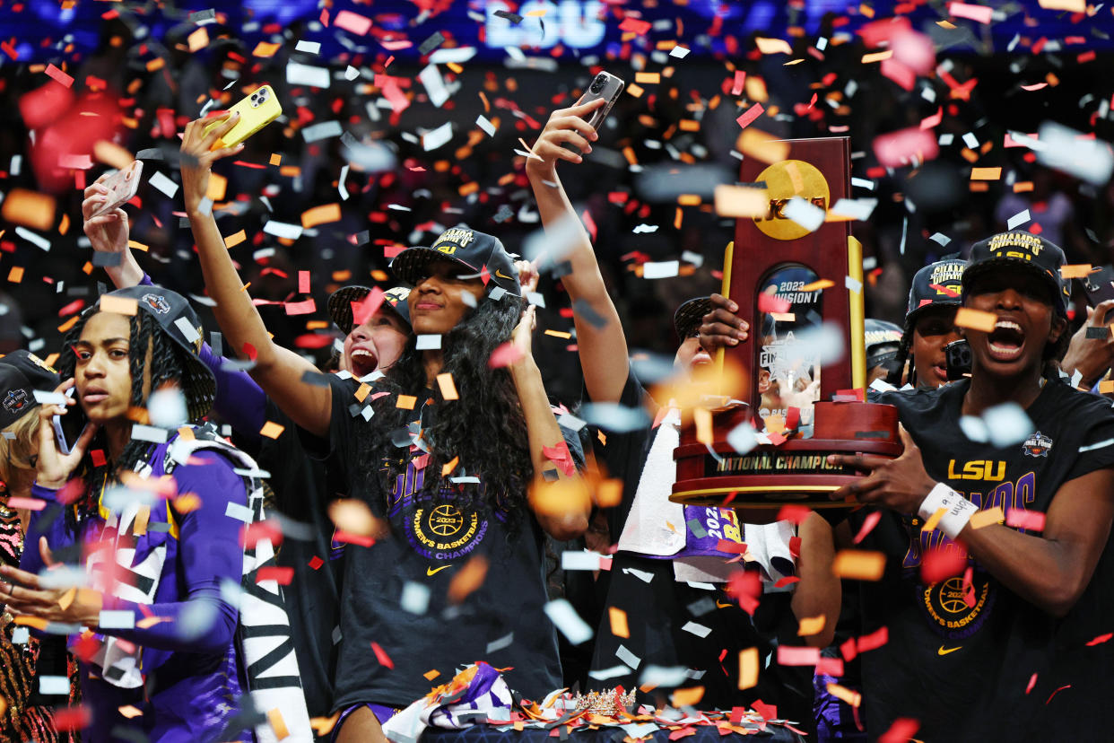 LSU's Angel Reese celebrates with teammates after winning the NCAA women's tournament national championship game at American Airlines Center in Dallas on April 2, 2023. (Tom Pennington/Getty Images)