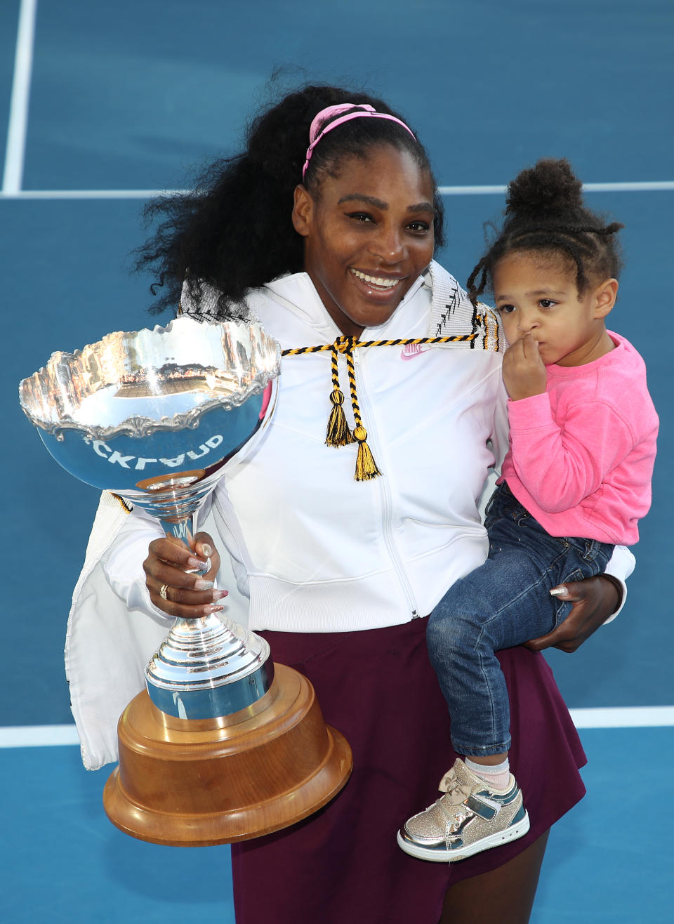 AUCKLAND, NEW ZEALAND - JANUARY 12: Serena Williams of the USA holds her daughter Alexis Olympia with the trophy following the Women's Final between Serena Williams and Jessica Pegula of the USA on day seven of the 2020 Women's ASB Classic at ASB Tennis Centre on January 12, 2020 in Auckland, New Zealand. (Photo by Phil Walter/Getty Images)