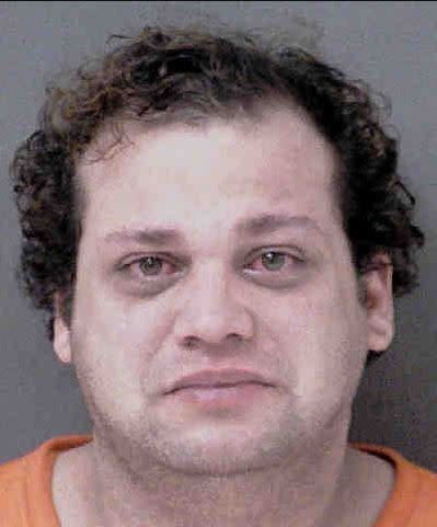 This undated booking photo provided by the Mecklenburg County, N.C., Sheriff's Office shows Erik Magana, of Charlotte, N.C., who authorities said stole mail from at least 1,300 victims' mailboxes and then fraudulently deposited checks. Magana was sentenced to more than 3 years in prison on Tuesday, Jan. 14, 2020, for mail theft and identity theft. (Mecklenburg County Sheriff's Office via AP)