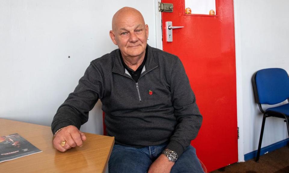 Paul McBean, a representative for the Community union at a desk in his office