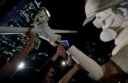 Protesters assemble Lady Liberty statue in Hong Kong