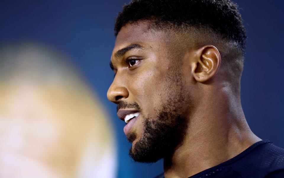  Anthony Joshua talks to media during the Rage on the Red Sea Media Arrival Event at Shangri-La Hotel on August 15, 2022 in Jeddah, Saudi Arabia