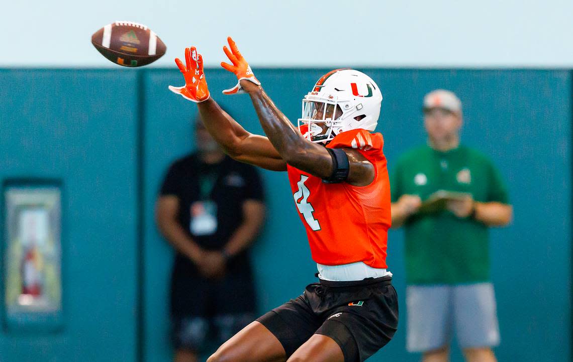 Miami Hurricanes wide receiver Colbie Young (4) participates in a drill during fall training camp at the Carol Soffer Indoor Practice Facility at the University of Miami on Wednesday, August 2, 2023 in Coral Gables, Florida.