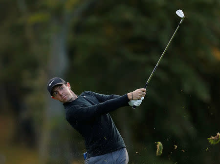 FILE PHOTO: Golf - European Tour - British Masters - Close House, Newcastle upon Tyne, Britain - September 28, 2017 Northern Ireland's Rory McIlroy in action during the first round Action Images via Reuters/Lee Smith