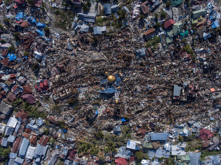 An aerial view of an area devestated by an earthquake in Palu, Central Sulawesi, Indonesia October 1, 2018 in this photo taken by Antara Foto. Antara Foto/ Hafidz Mubarak A/ via REUTERS