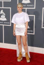 Singer Robyn wore this mini dress and train with platform sneakers to the Grammy Awards.