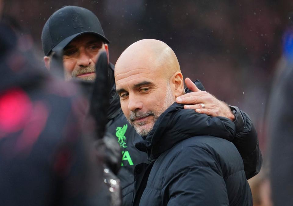 Klopp and Guardiola embraced at full time (AP)