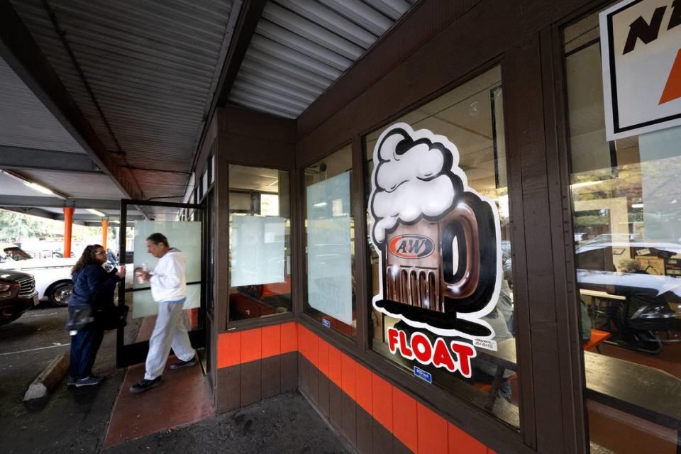 Customers have flocked to A&W restaurant before it closes next week. Photographed in Modesto, Calif., Friday Nov. 17, 2023. The “American Graffiti” era drive-in burger joint is closing after 66 years of continuous service.