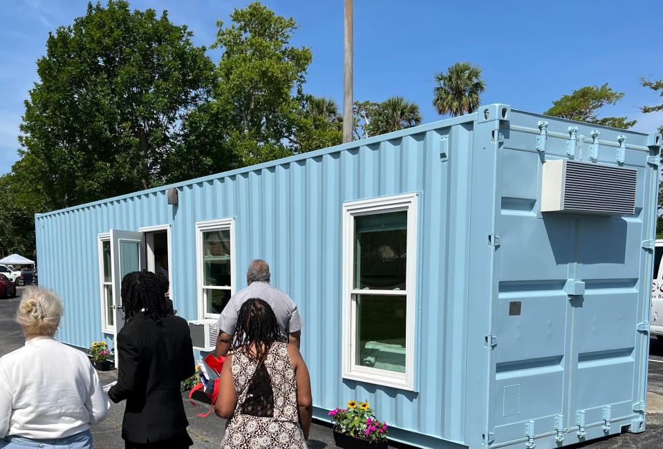 Attendees at last year's Housing Fair & Financial Clinic in Daytona Beach check out a model container home on display. The free event aimed at first-time homebuyers and those in need of financial, legal, insurance and health care services, will be held again this year from 10 a.m. to 2 p.m. at Allen Chapel AME Church, 580 George W. Engram Blvd., Daytona Beach, on Saturday, April 29, 2024.