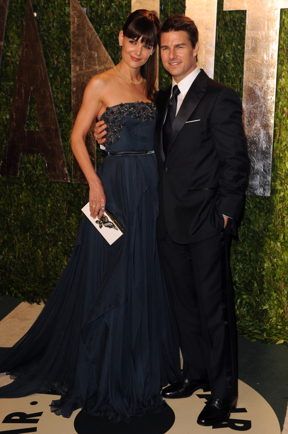 Katie Holmes (L) and Tom Cruise attend Vanity Fair's 18th annual Oscars party at the Sunset Tower Hotel. (Photo by Tyler Boye/WWD/Penske Media via Getty Images)