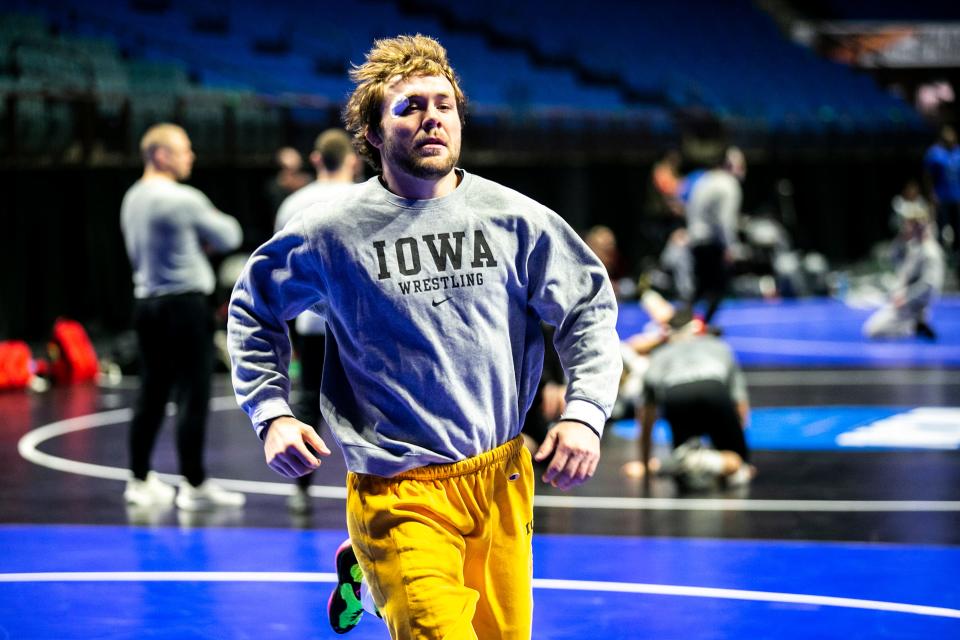 Iowa's Jacob Warner warms up during the practice session of the NCAA Division I Wrestling Championships, Wednesday, March 15, 2023, at BOK Center in Tulsa, Okla.