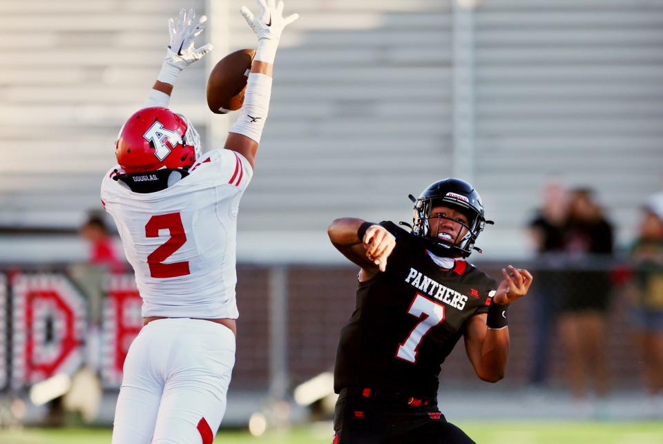 American Fork’s Dax Watts knocks down a pass attempt by West’s Isaiah SueSue as the two teams play in Salt Lake City on Friday, Aug. 25, 2023. AF won 45-21. | Scott G Winterton, Deseret News